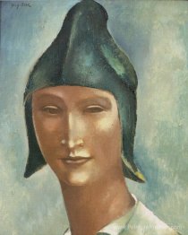 Tête d'un jeune homme dans un chapeau pointu
