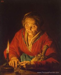 Vieille femme avec une bougie