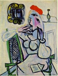 Femme avec un chapeau rouge