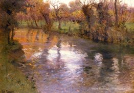 Un verger sur les rives d'une rivière