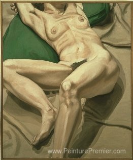 Nu sur le coussin vert