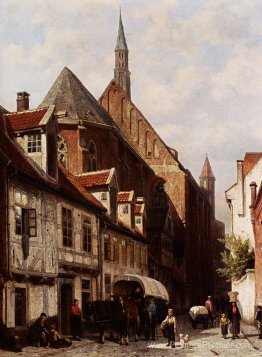 Une rue animée à Brême avec l'église Saint Johann en arrière-pla