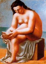 Assis nu séchant ses pieds
