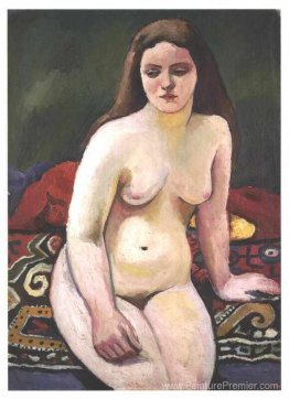 Femelle nue sur un tapis dirigée