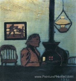 Homme assis près de poêle