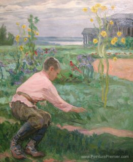 Garçon sur une herbe