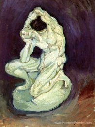 Statuette en plâtre d'un homme à genoux