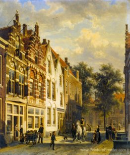 Figures dans les rues ensoleillées d'une ville néerlandaise