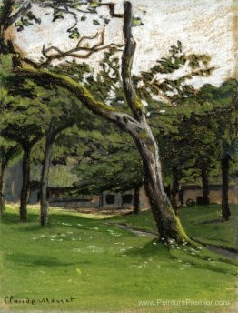 Ferme normande à travers les arbres