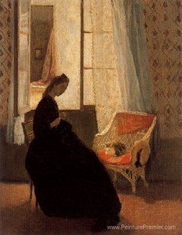 Femme coudre à une fenêtre