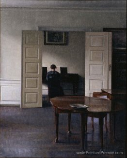 Intérieur avec Ida jouant du piano
