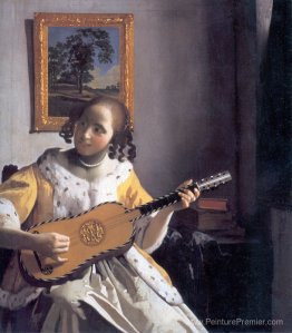 Youg Woman joue une guitare