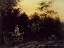 Paysage avec une piste et un homme assis sur une porte