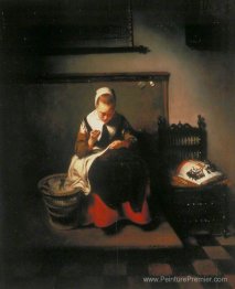 Une jeune femme coudre
