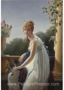 Une jeune femme assise par une fenêtre