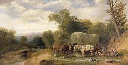 Carthorses et rustiques par un ruisseau