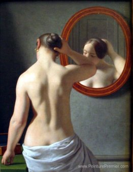 Femme debout devant un miroir Femme debout devant un miroir