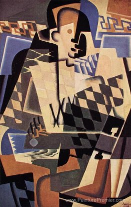 Harlequin avec une guitare Harlequin avec une guitare