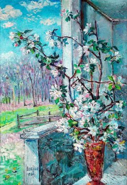Branche fleurisante dans un vase Branche fleurisante dans un vase
