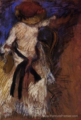 Femme assise dans une robe blanche Femme assise dans une robe blanche