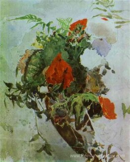 Fleurs rouges et feuilles de bégonia dans un panier Fleurs rouges et feuilles de bégonia dans un panier