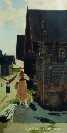 Dans le village. Fille avec un seau Dans le village. Fille avec un seau