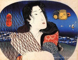 Femme réparant un filet de poisson Femme réparant un filet de poisson