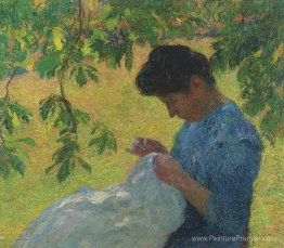 Jeune femme coudre dans le jardin Jeune femme coudre dans le jardin