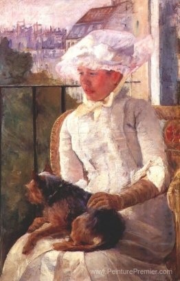 Susan sur un balcon tenant un chien Susan sur un balcon tenant un chien