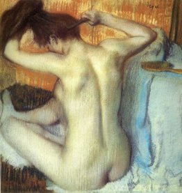 Femme peignant ses cheveux Femme peignant ses cheveux