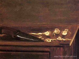 Gousses d'ail et couteau au coin d'une table Gousses d'ail et couteau au coin d'une table