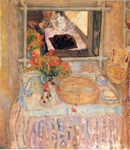 Toilettes avec un bouquet rouge et jaune Toilettes avec un bouquet rouge et jaune