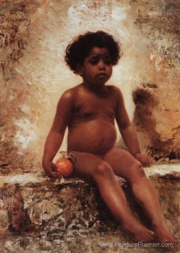 Garçon arabe avec une orange Garçon arabe avec une orange