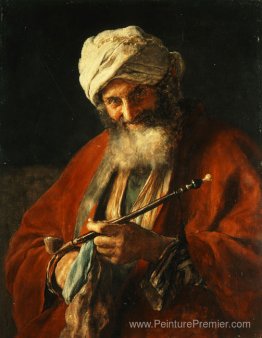 Homme oriental avec un tuyau Homme oriental avec un tuyau