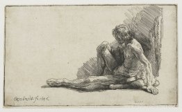 Homme nu assis sur le sol avec une jambe étendue Homme nu assis sur le sol avec une jambe étendue