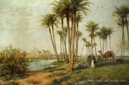 Bédouin à une oasis avec des pyramides Bédouin à une oasis avec des pyramides