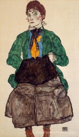 Femme dans un chemisier vert et manche Femme dans un chemisier vert et manche