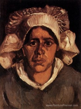 Tête d'une paysanne avec une casquette blanche Tête d'une paysanne avec une casquette blanche