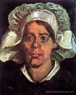 Tête d'une paysanne avec une casquette blanche Tête d'une paysanne avec une casquette blanche