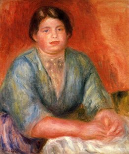 Femme assise dans une robe bleue Femme assise dans une robe bleue