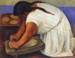 Femme broyant le maïs Femme broyant le maïs
