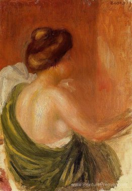 Femme assise dans une robe verte Femme assise dans une robe verte