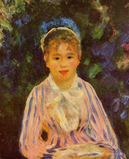 Jeune femme dans une chemise à rayures bleues et roses Jeune femme dans une chemise à rayures bleues et roses