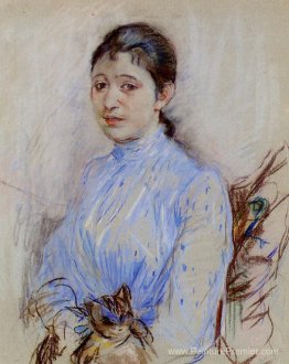 Jeune femme dans un chemisier bleu Jeune femme dans un chemisier bleu
