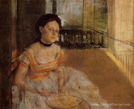 Femme assise sur un balcon Femme assise sur un balcon