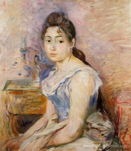 Jeune femme dans un chemisier bleu Jeune femme dans un chemisier bleu