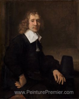 Un jeune homme à une table (peut-être Govaert Flinck) Un jeune homme à une table (peut-être Govaert Flinck)
