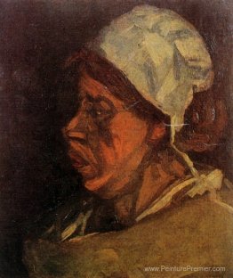 Tête d'une paysanne avec une casquette blanche Tête d'une paysanne avec une casquette blanche