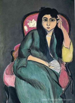 Laurette en vert dans une chaise rose Laurette en vert dans une chaise rose