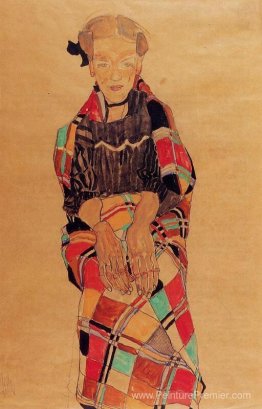Fille en noire noire, enveloppée dans une couverture à carreaux Fille en noire noire, enveloppée dans une couverture à carreaux
